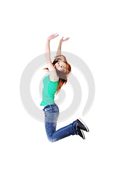 Teenage student jumping.