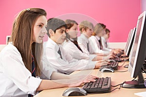 Teenage Students In IT Class Using Computers