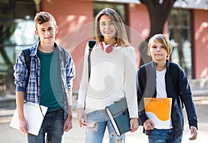 Teenage students going to college