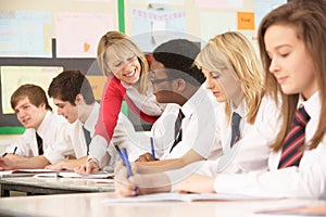 Teenage Students Studying In Classroom