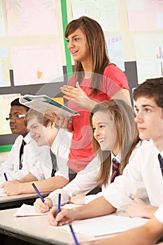 Teenage Students Studying In Classroom