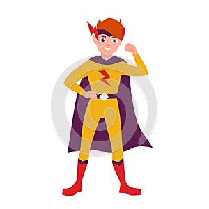 Teenage superhero, superboy or superkid standing in heroic pose. Young boy wearing bodysuit and cape. Brave and photo