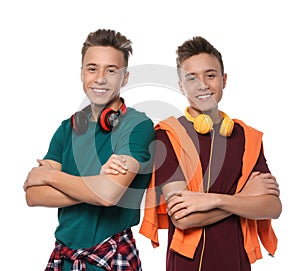 Teenage twin brothers with headphones