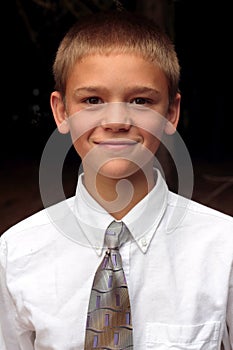 Teenaged boy wearing tie