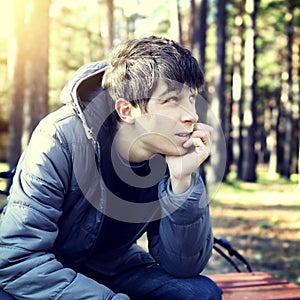 Teenager in the Autumn Park