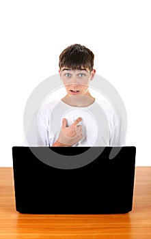 Teenager behind Laptop