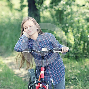 Teenager with a bicycle