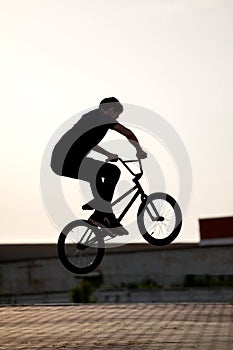 Teenager on a bicycle