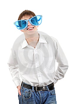 Teenager in Big Blue Glasses