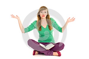 Teenager with book gesturing