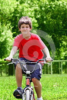 Teenager boy with bicycles