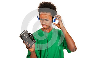 Teenager boy connecting with vintage photo camera