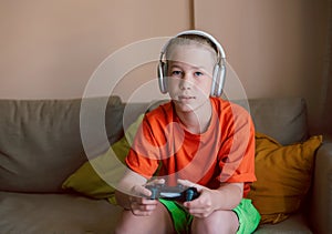 teenager boy playing video games