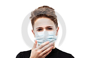 Teenager boy wearing respiratory protective medical mask