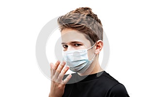 Teenager boy wearing respiratory protective medical mask