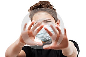 Teenager boy wearing respiratory protective medical mask