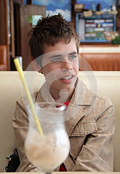 Teenager in Cafe