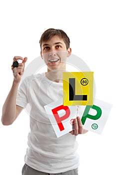 Teenager with car licence plates looking up