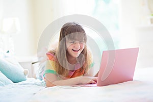 Teenager and computer. Girl chatting with friends