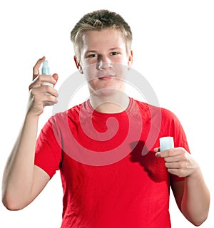 Teenager with a cream for a problem youthful skin