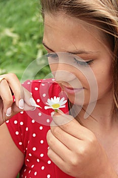 Teenager and daisy photo