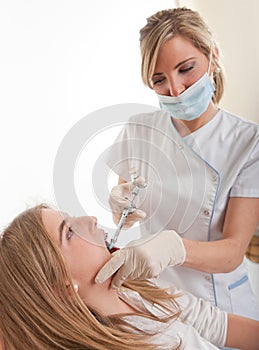 Teenager at the dentist photo