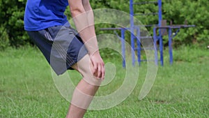 Teenager doing workout outdoors, healthy lifestyle