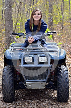 Teenager on a Four Wheeler