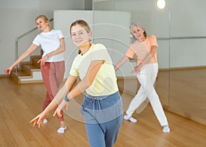 Teenager girl dancing in dance center