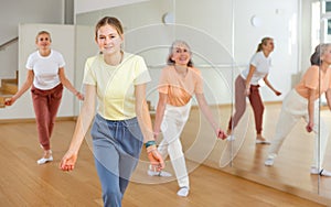 Teenager girl dancing in dance center