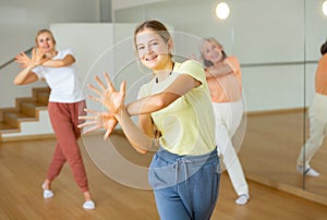 Teenager girl dancing in dance center