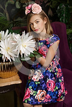 Teenager girl in flower wreath