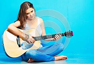 Teenager girl guitar play