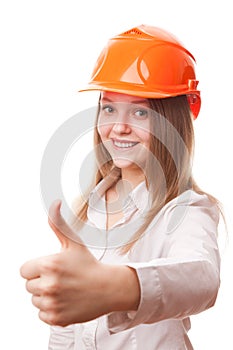 Teenager girl in a hardhat