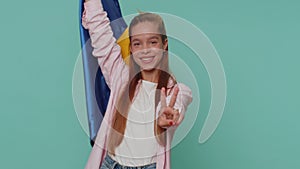 Teenager girl hold Ukraine national flag, showing victory sign against war, hoping for success win