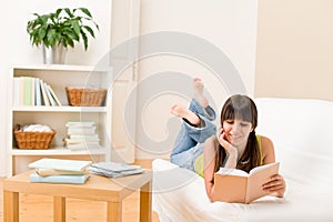 Teenager girl home - student read book