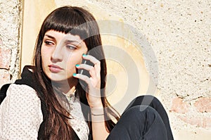 Teenager girl outside on the phone