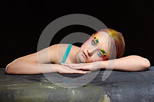 Teenager girl portrait with unusual face art make-up