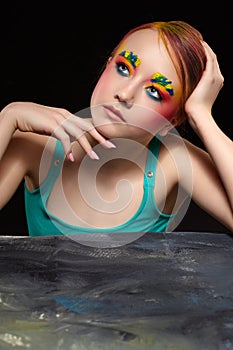 Teenager girl portrait with unusual face art make-up