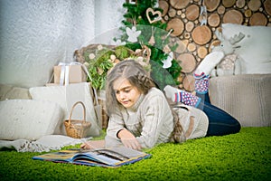 Teenager girl reading a book