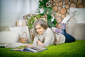 Teenager girl reading a book photo