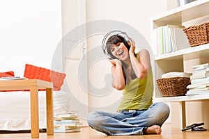 Teenager girl relax home - happy listen to music