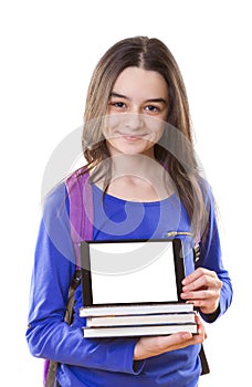 Teenager girl with schoolbag and digital tablet photo