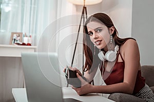 Teenager girl spending money on online shopping