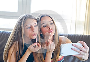 Teenager girls best friends makeup selfie camera