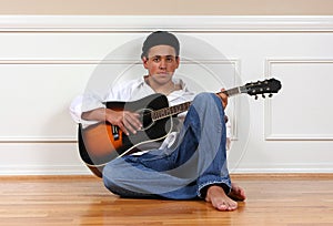 Teenager with guitar