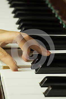 Teenager hand on piano keys, Concept music practice, training, developing fluent hand movement