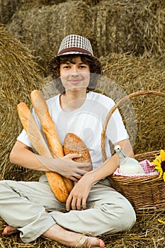 Teenager on a haystack