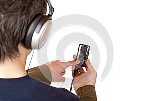 Teenager with headset use mp3 music player