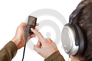 Teenager with headset use mp3 music player